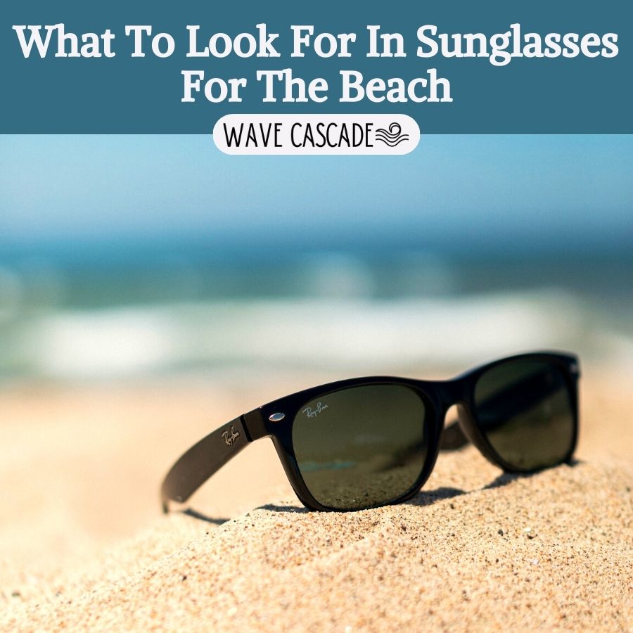 sunglasses for beach - raybans sitting on the sand
